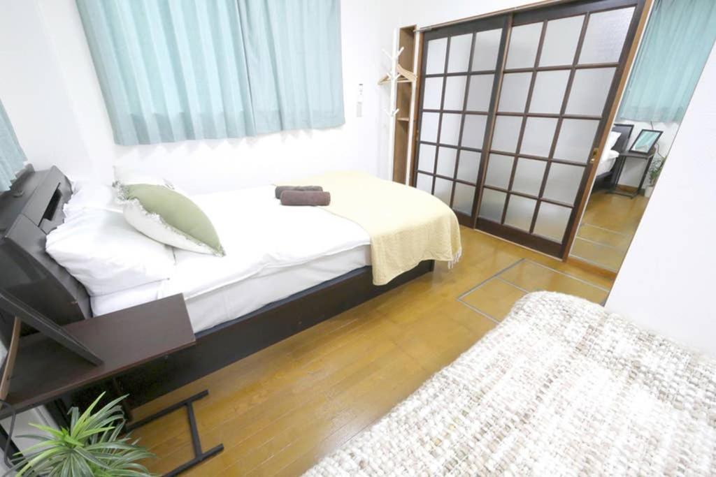 マスク配布ありa5 新宿10分 10人宿泊可能 出張在宅勤務に最適!!宿泊型テレワークスペース!!Wifi完備 回線安定してます!!長期宿泊受付中 โตเกียว ภายนอก รูปภาพ
